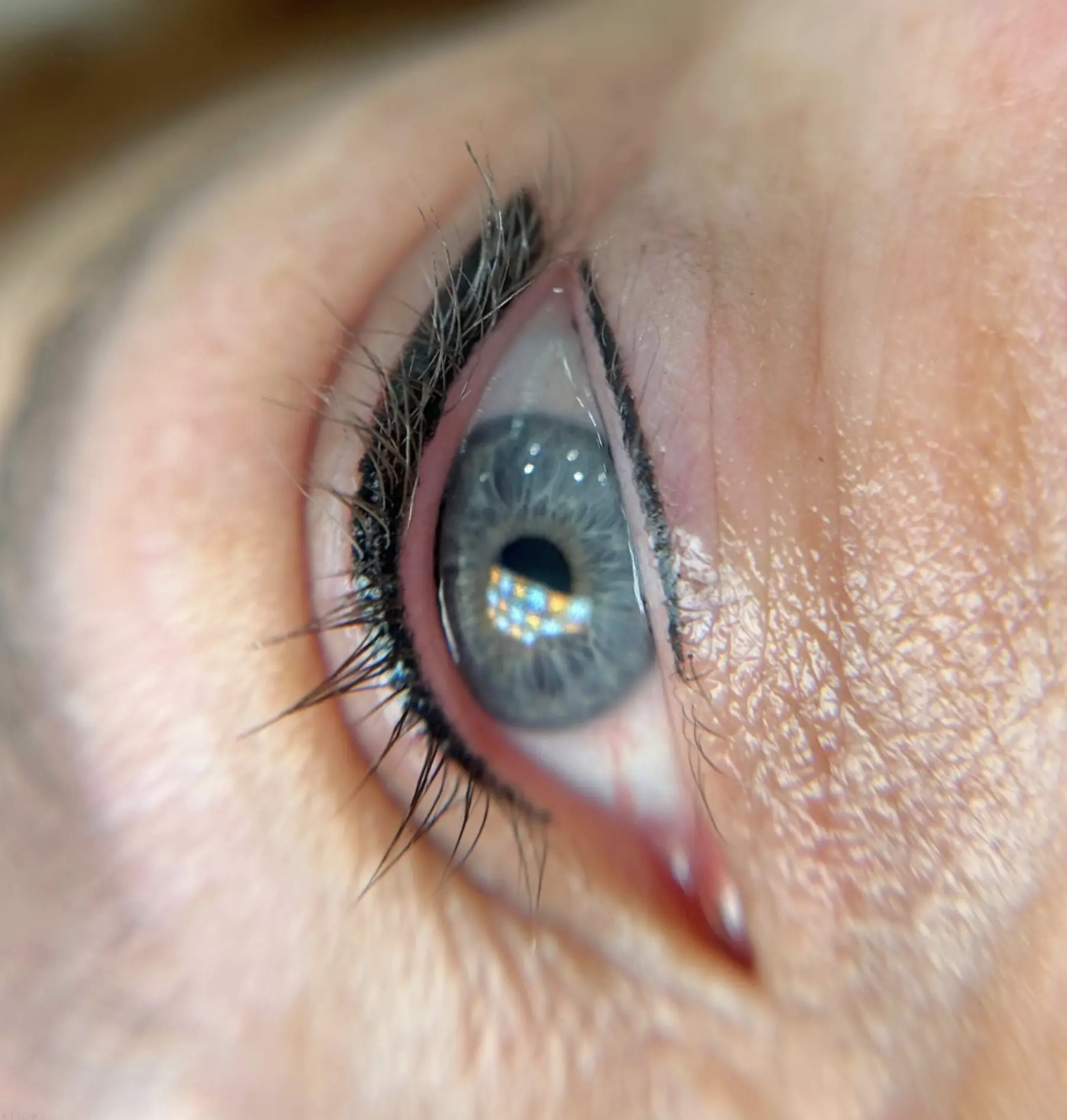 client consultation for eyeliner tattoo